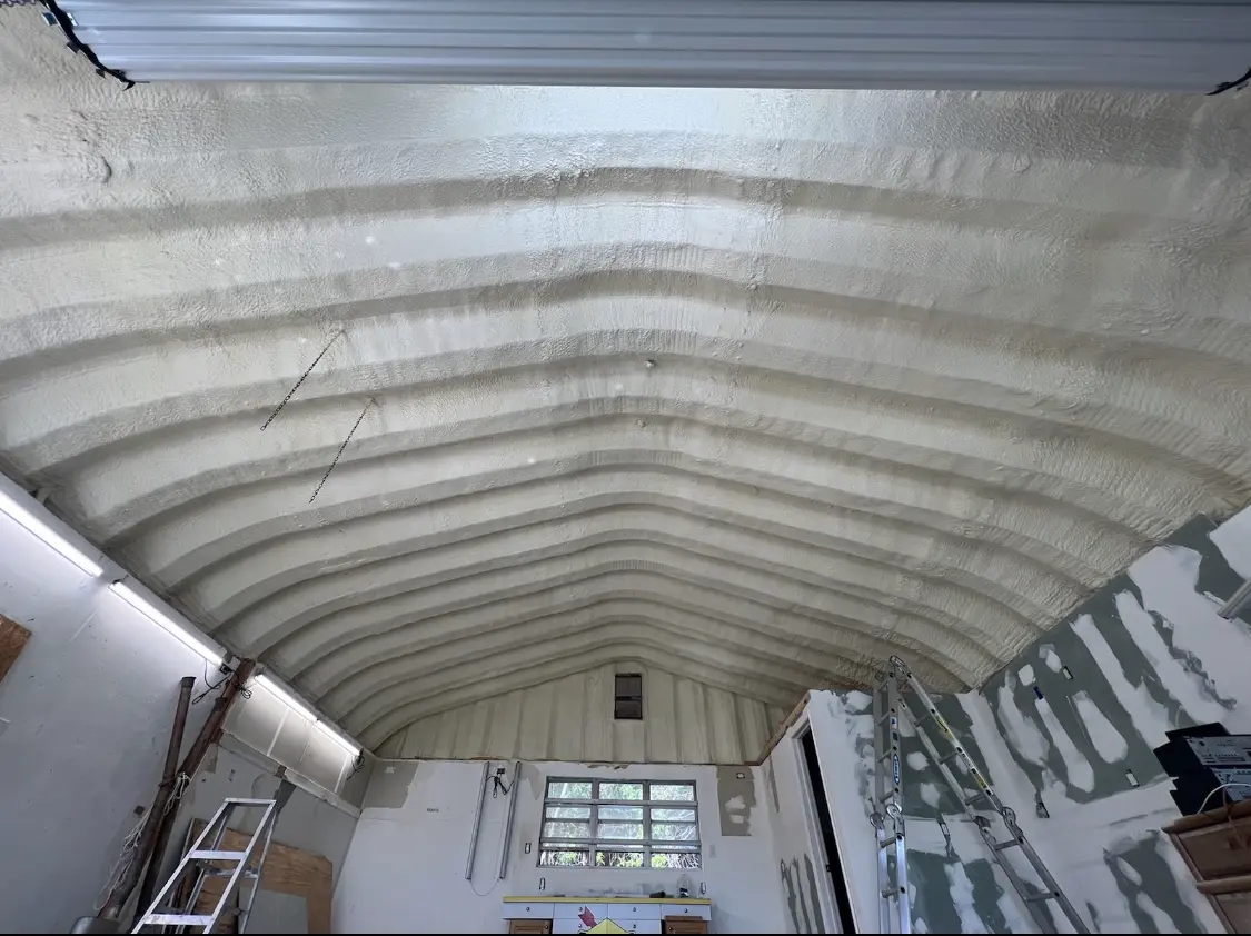 Spray polyurethane foam applied to the underside of a metal roof deck in Glendale